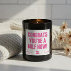 Congrats You’re a MILF Now soy wax candle in matte black glass jar with pink label and ash wooden lid, funny new mum gift, baby shower present