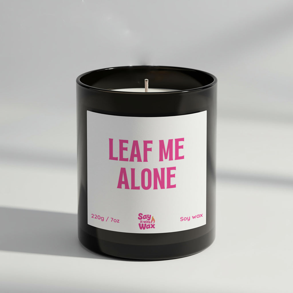 Leaf Me Alone soy wax candle in matte black glass jar with green label and ash wooden lid, autumn home décor scented with Blackberry & Bay