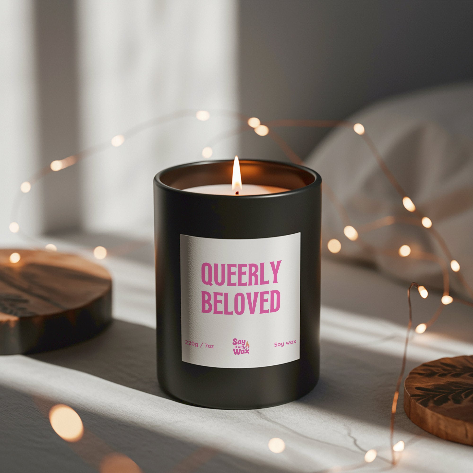Queerly Beloved soy wax candle in matte black glass jar with statement label and ash wooden lid, LGBTQ+ wedding, engagement and anniversary gift