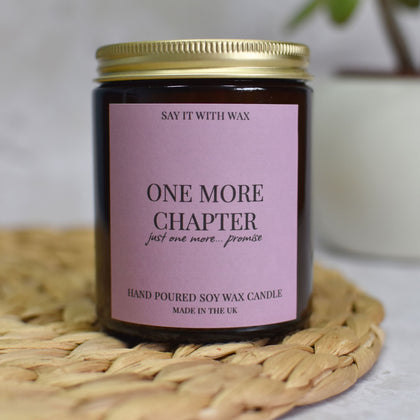 One More Chapter candle gift for book lovers, amber jar soy candle with pink label, cosy reading night candle UK
